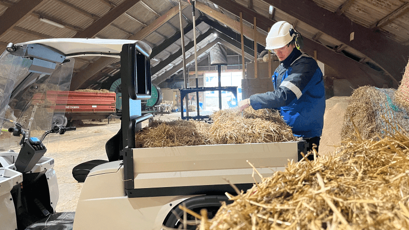 Paxster with hay on the cargo bed at Tomb Agricultural School.